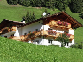 A well kept holiday home full of atmosphere and with a wooden decor, Außervillgraten